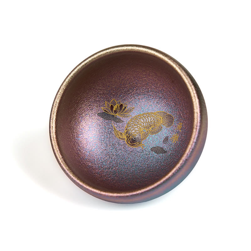 Jianzhan Koi Fish Lotus Teacup – top-down showing full interior, gold koi carp and lotus, iridescent bronze, white bg