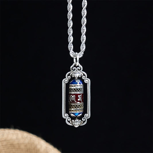 Om Mani Padme Hum Prayer Wheel Pendant – Front view showing Tibetan script on red mantra barrel with lotus frame, spiritua...