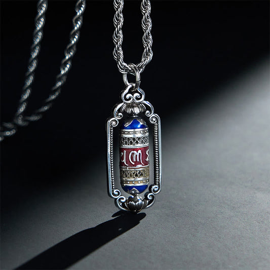 Om Mani Padme Hum Prayer Wheel Pendant – Three-quarter view of prayer wheel with blue and red enamel bands on rope chain, ...