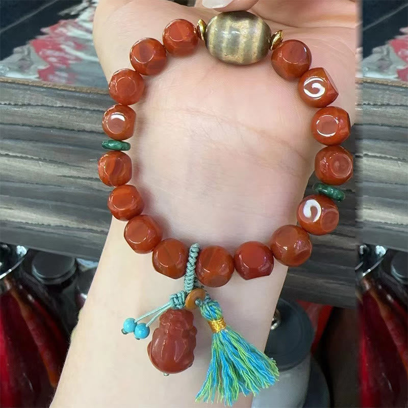 South Red Agate Dzi Bead PiXiu Bracelet – model wrist wear lifestyle shot, women good luck gift