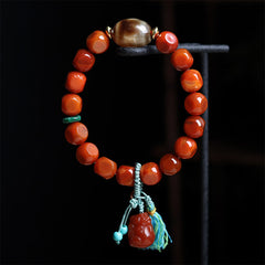 South Red Agate Dzi Bead PiXiu Bracelet – hanging on black stand full view, good fortune agate jewelry