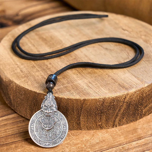 Mountain Ghost Bagua Copper Pixiu Necklace – full necklace on wood slice black cord, pixiu bagua protection charm