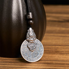 Mountain Ghost Bagua Copper Pixiu Necklace – black ceramic vase background detailed engraving, bagua talisman