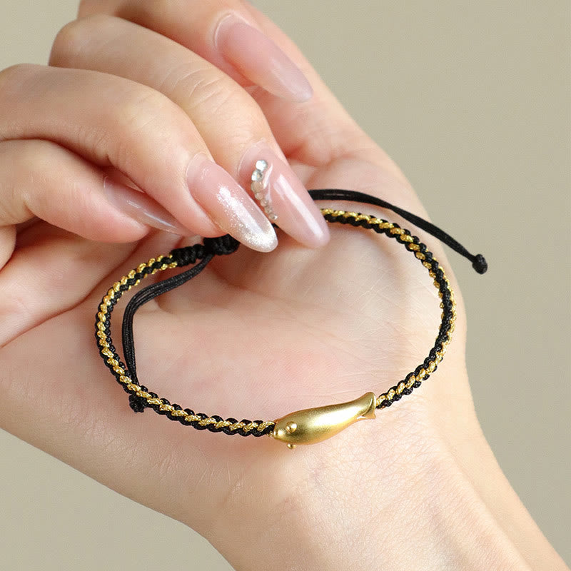 999 Sterling Silver Koi Fish Rope Bracelet – black gold cord in hand, macro charm detail