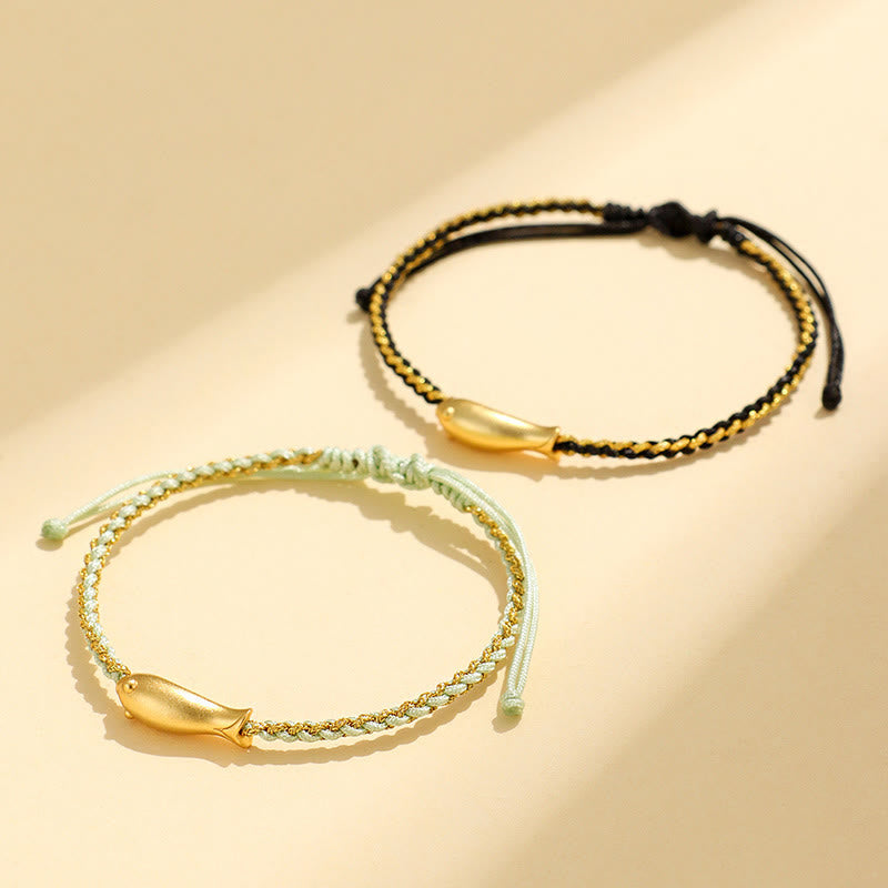 999 Sterling Silver Koi Fish Rope Bracelet – dark green gold cord with koi charm, flat lay