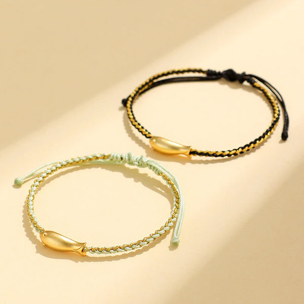 999 Sterling Silver Koi Fish Rope Bracelet – dark green gold cord with koi charm, flat lay
