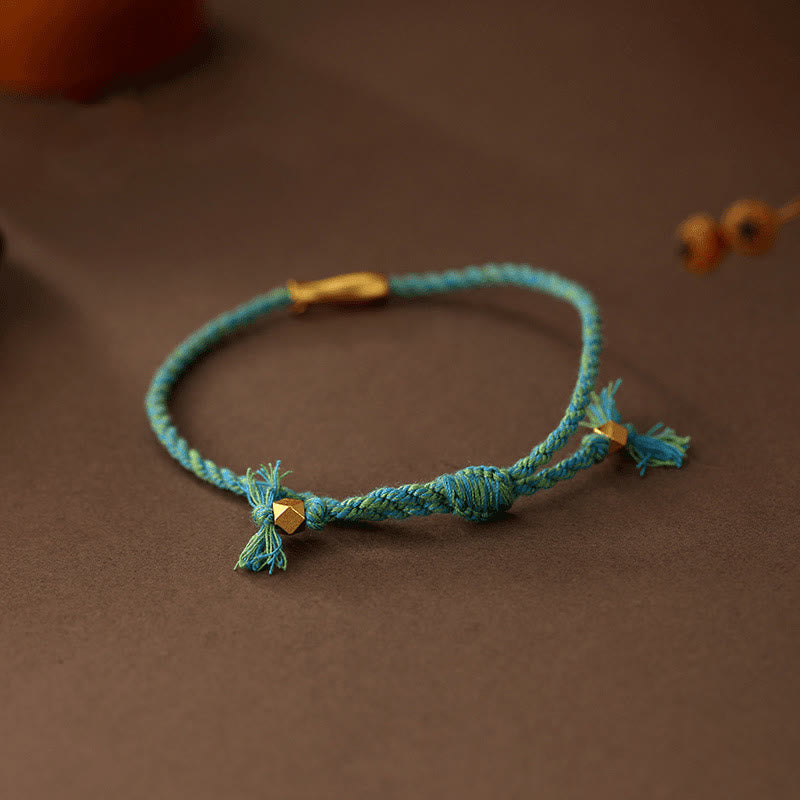 Copper Lucky Koi Fish Rope Bracelet – close-up teal braided cord with gold beads, luck amulet