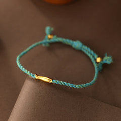 Copper Lucky Koi Fish Rope Bracelet – teal cord showing adjustable sliding knot, healing bracelet