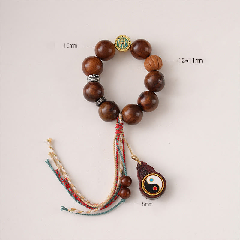 Tibet Jujube Wood Yin Yang Bracelet – flat lay with size annotations showing 15mm wood beads, carved accent and yin-yang p...