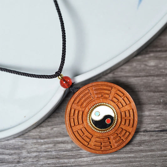 Jujube Wood Yin Yang Bagua Necklace – Wooden disc pendant with eight trigrams and yin-yang inlay on rustic surface, feng s...