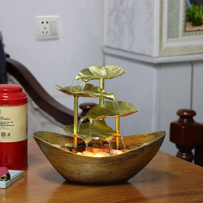 Lotus Leaf LED Waterfall Fountain - antique gold leaf tiers with pebbled basin, brass tabletop fountain