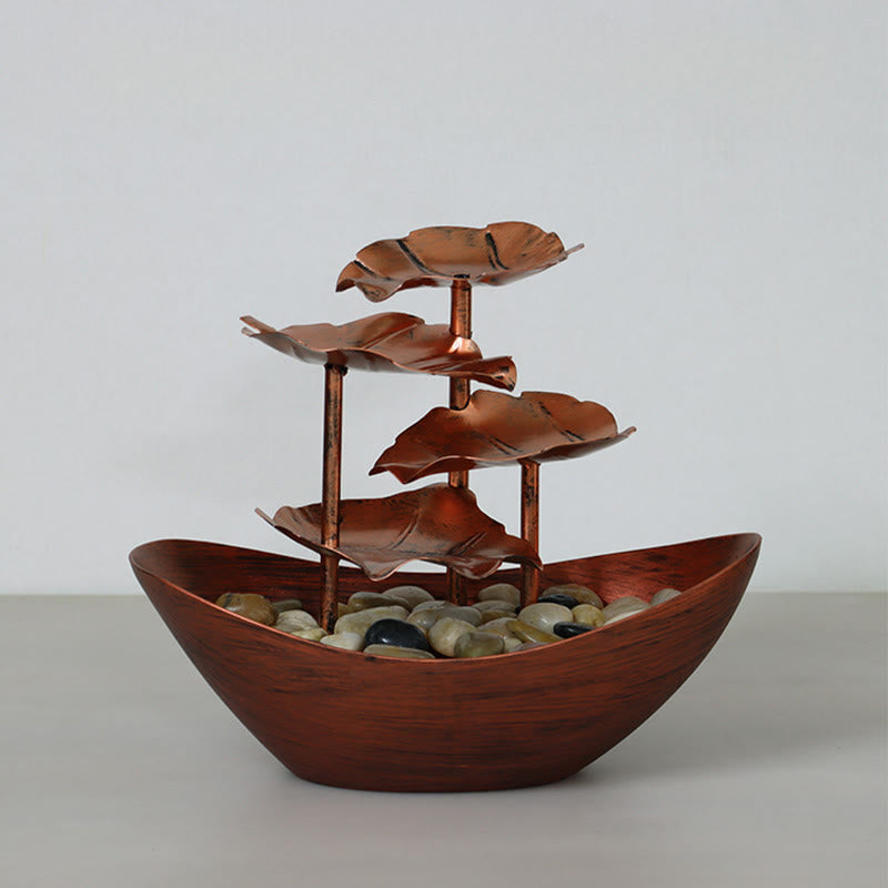 Lotus Leaf LED Waterfall Fountain - copper cascade among vintage decor and warm lighting, elegant fountain
