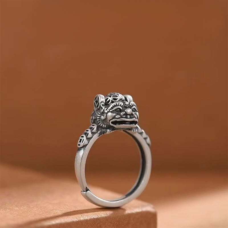 Copper Coin Pixiu Feng Shui Ring – silver pixiu ring front view brown background, rotatable wealth ring