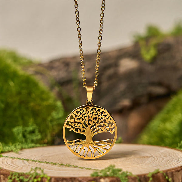 Tree of Life Titanium Steel Necklace – gold-tone pendant on wood slice with moss, nature spiritual jewelry