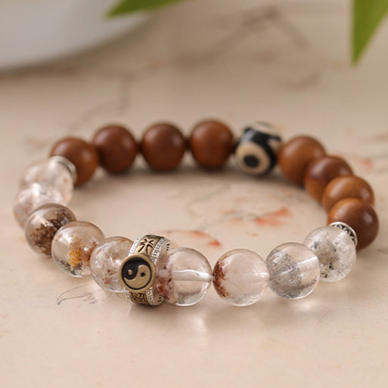 Lightning Struck Wood Red Phantom Bracelet – close-up showing wooden beads and phantom quartz with natural inclusions on n...