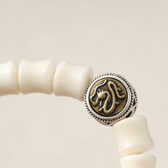 Bodhi Seed Dragon Pattern Bracelet – macro coiled serpent medallion with rope border, Strength