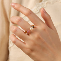 Tourmaline Pearl Amber Pixiu Ring – worn on finger lace dress background, love luck crystal jewelry
