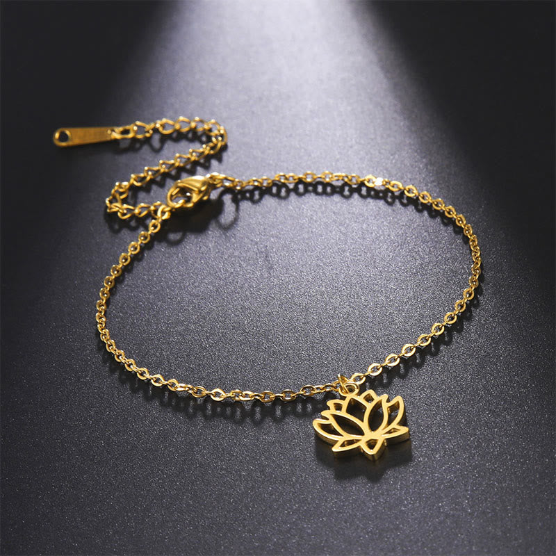 Lotus Titanium Steel Bracelet – gold lotus pendant dark background, elegant detail