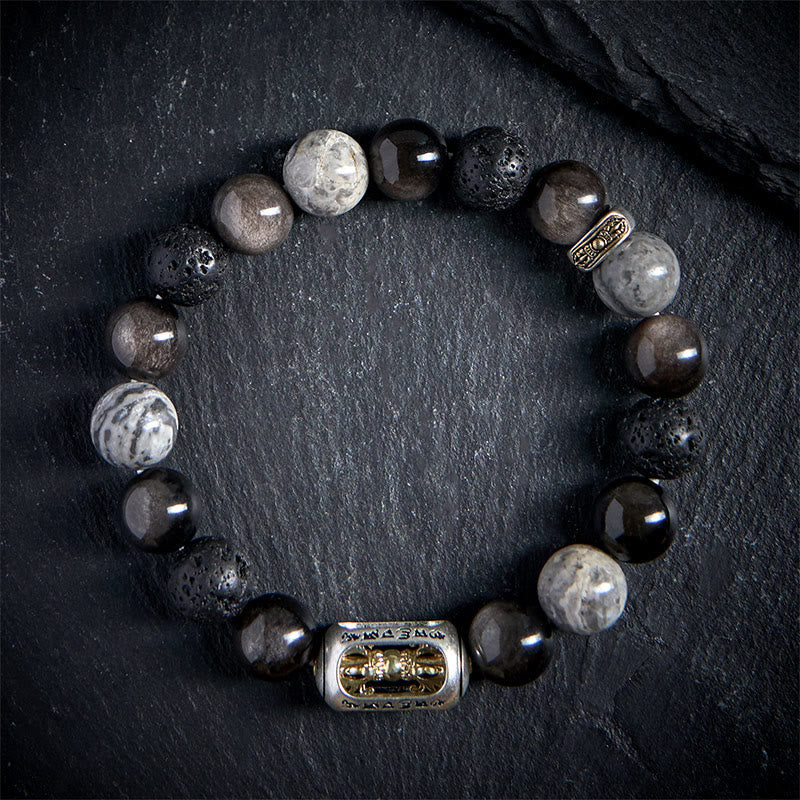 Silver Sheen Obsidian Lava Rock Vajra Bracelet – Overhead view on slate, obsidian lava bead bracelet