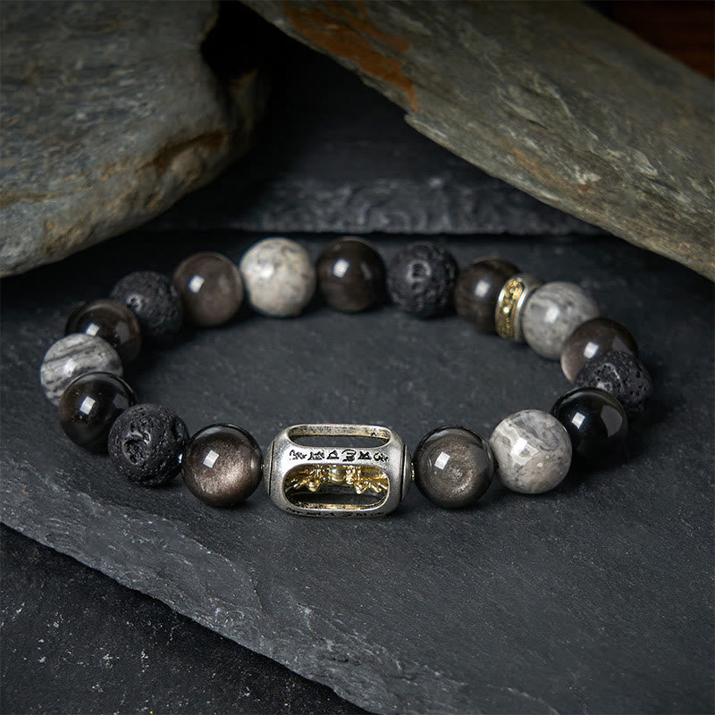 Silver Sheen Obsidian Lava Rock Vajra Bracelet – Flat lay on dark stone showing mixed beads, men’s healing bracelet