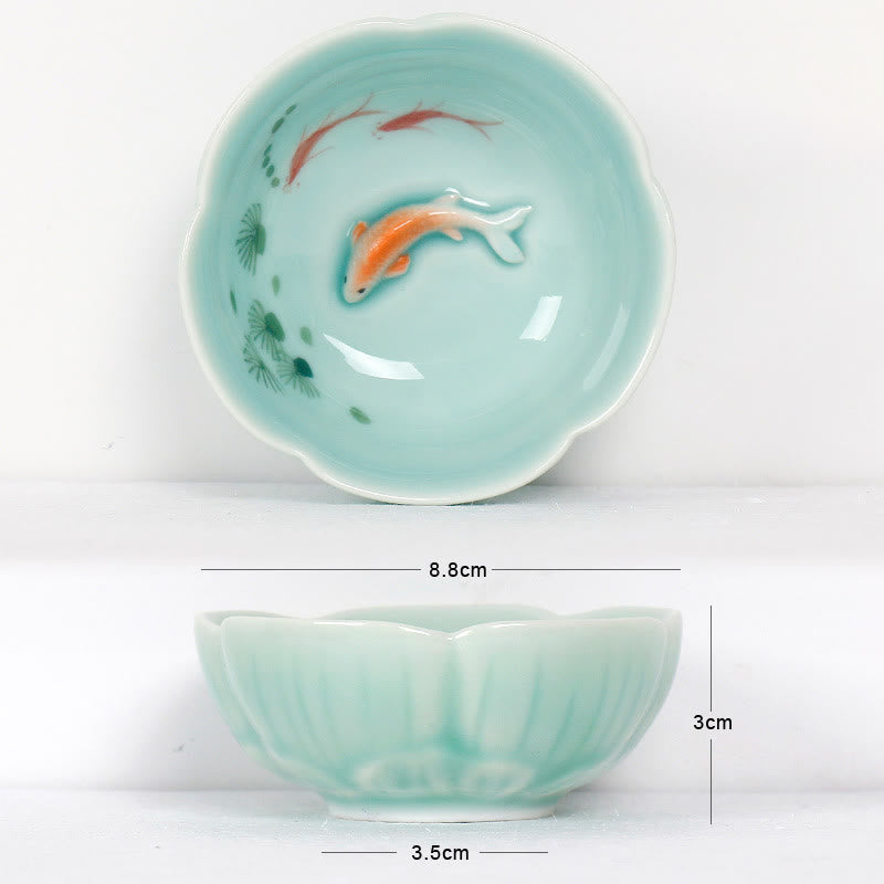 Koi Fish & Lotus Tea Cup – Orange koi and green plants in celadon interior, fluted tea cup
