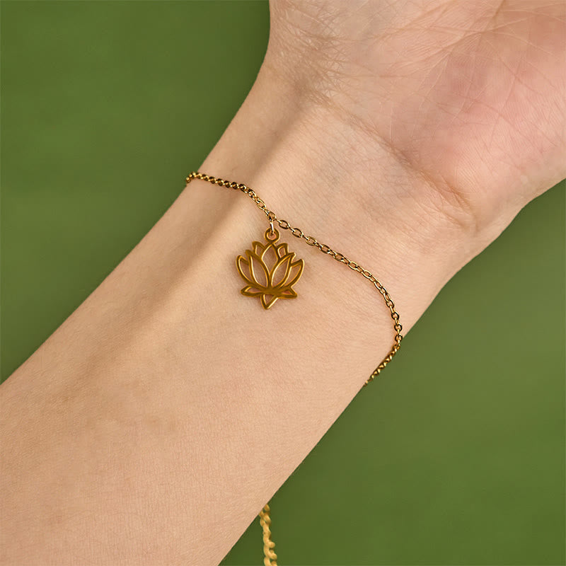 Lotus Titanium Steel Bracelet – gold lotus charm worn on wrist, close-up