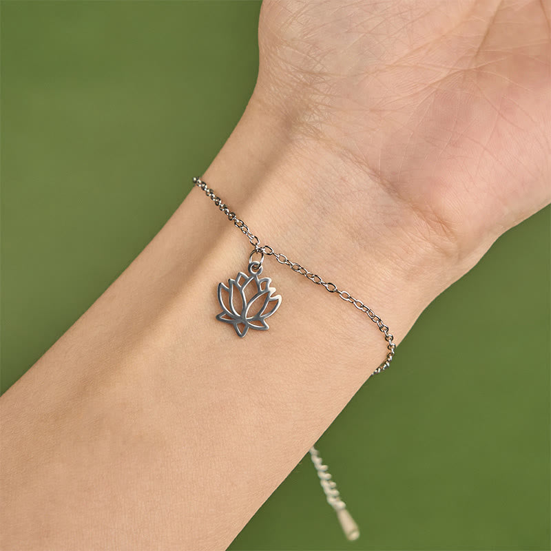 Lotus Titanium Steel Bracelet – silver lotus charm worn on wrist, close-up