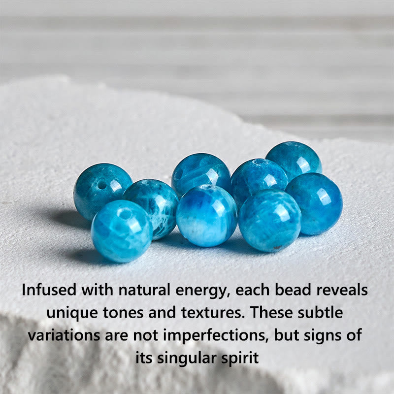 Apatite Lotus Silver Bracelet – loose blue apatite beads on rough stone, natural white veining, polished gemstone beads