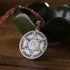 Om Mani Padme Hum Pendant Necklace – hexagram star design with colored Sanskrit symbols on braided cord, spiritual talisman