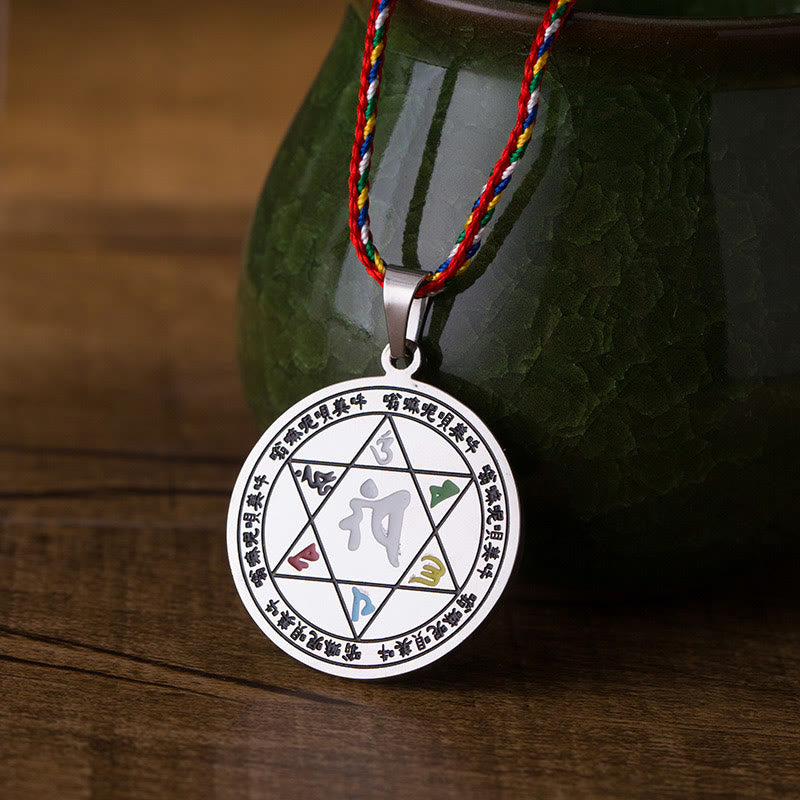 Om Mani Padme Hum Pendant Necklace – six-pointed star engraving with mantra syllables on multicolor braid, meditation amulet