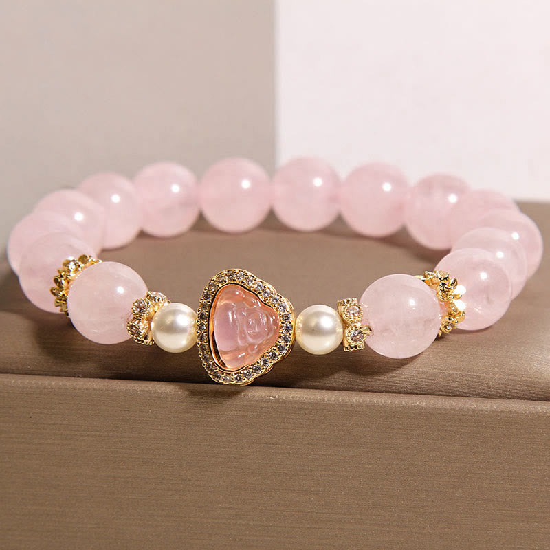 Pink Crystal Pearl Buddha Bracelet – front view pink crystal spheres, pearls and diamond-studded gold Buddha charm, closeup
