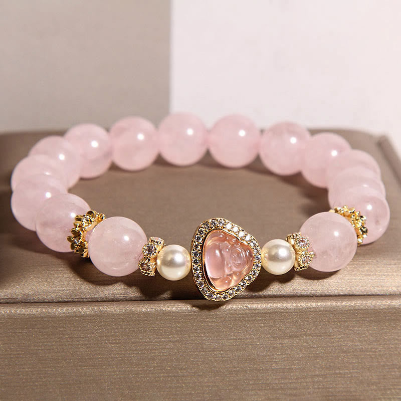 Pink Crystal Pearl Buddha Bracelet – closeup front showing smooth pink crystal beads and Buddha centerpiece, macro