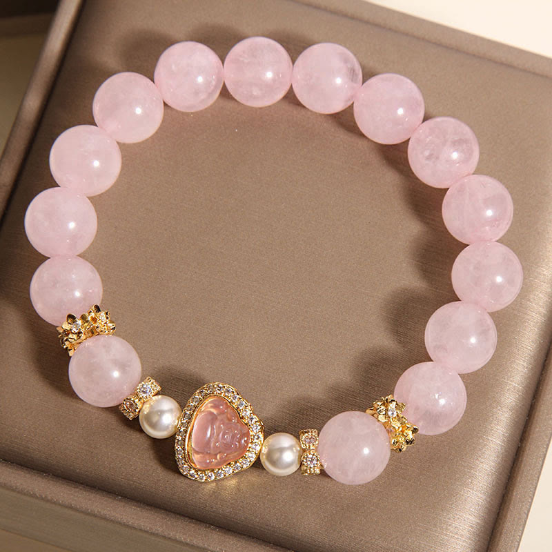 Pink Crystal Pearl Buddha Bracelet – overhead flatlay of bracelet on brown satin surface, flatlay studio