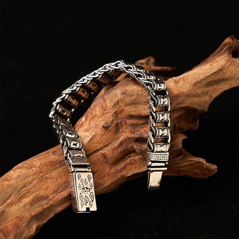Copper Auspicious Clouds Om Mani Padme Hum Bracelet – Engraved barrel links on neutral fabric, copper men’s jewelry