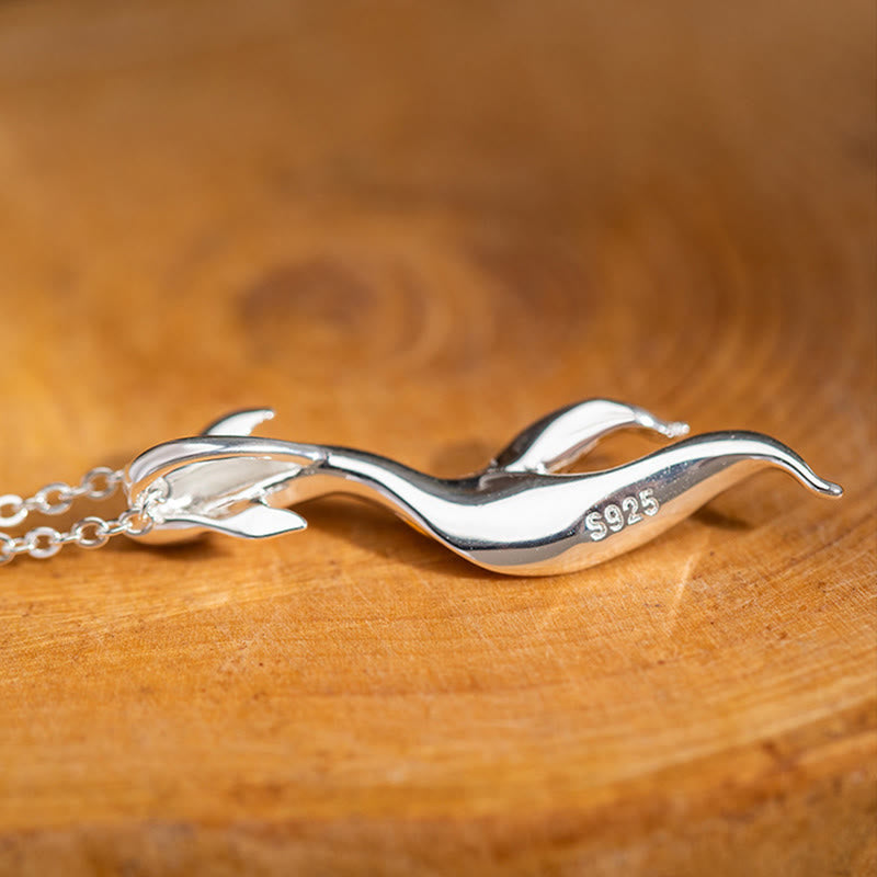 Silver Golden Koi Fish Luck Necklace – close-up S925 stamp on koi pendant, sterling silver on wood surface