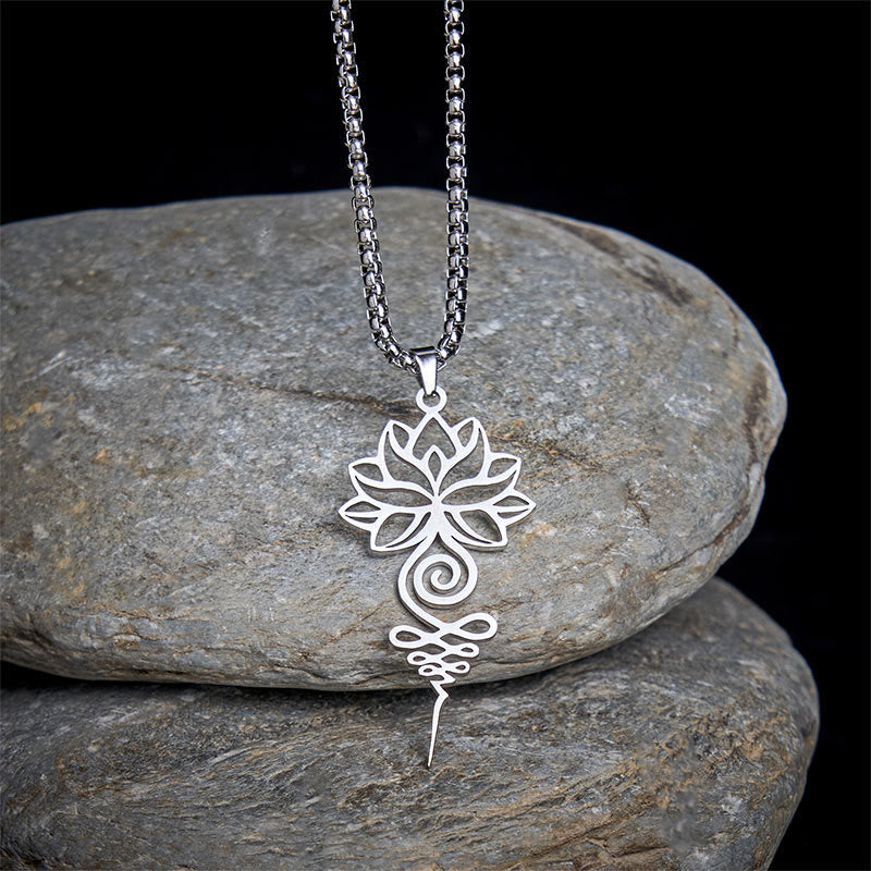 Lotus Unalome Necklace – Silver pendant with cutout lotus and spiral on black with stones, spiritual jewelry
