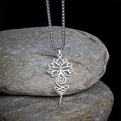 Lotus Unalome Necklace – Silver pendant with cutout lotus and spiral on black with stones, spiritual jewelry