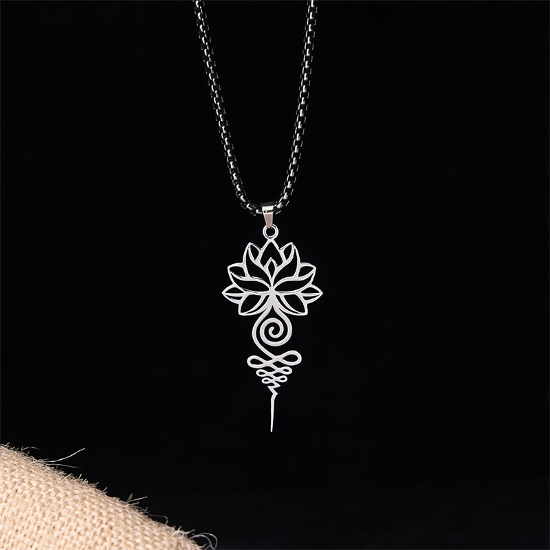 Lotus Unalome Necklace – Silver cutout lotus-unalome pendant on box chain, black backdrop, enlightenment pendant
