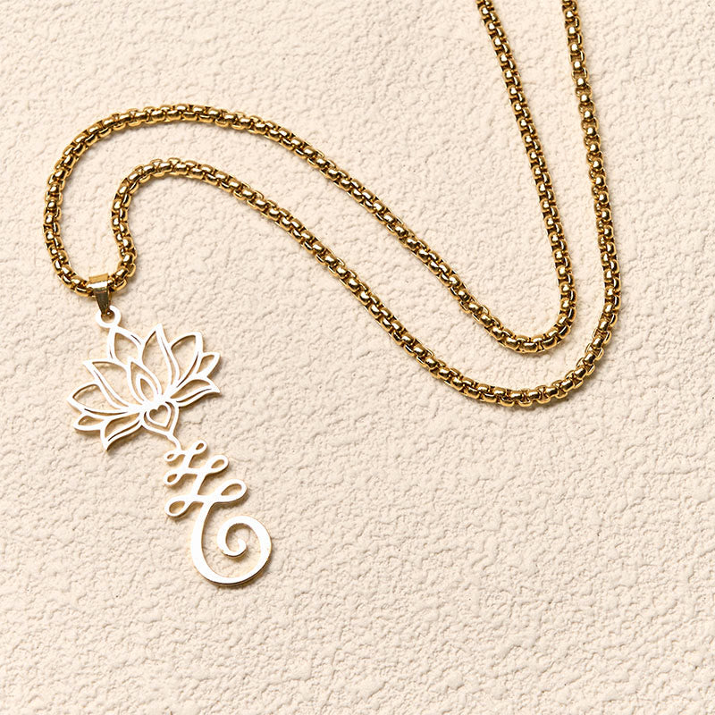 Chakra Lotus Necklace – Gold lotus-Life pendant in overhead flat lay, chakra life jewelry