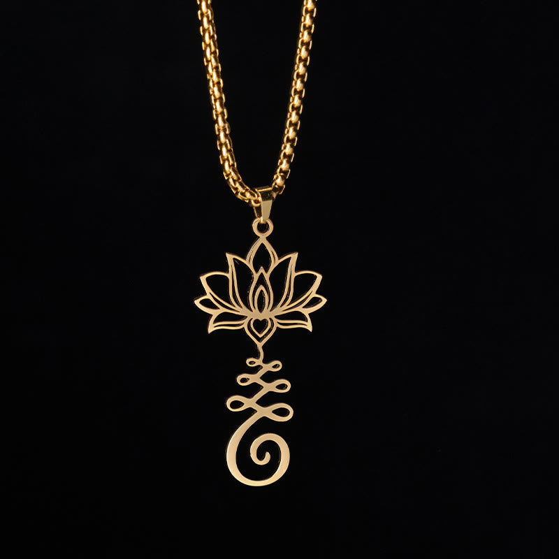 Chakra Lotus Necklace – Gold lotus heart pendant on black backdrop, enlightenment necklace