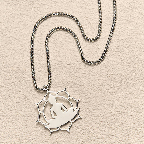 Vintage Lotus Sitting Buddha Stainless Steel Necklace – male model wearing under open collar shirt, subtle spiritual accessory