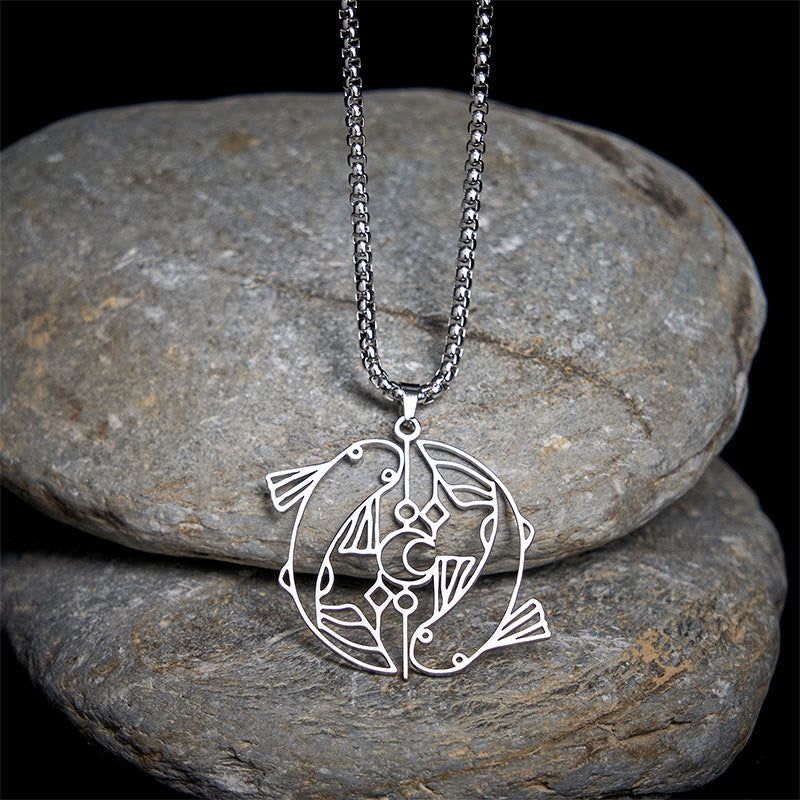 Vintage Koi Fish Hollow Luck Necklace – silver koi pendant on stacked river stones, black background