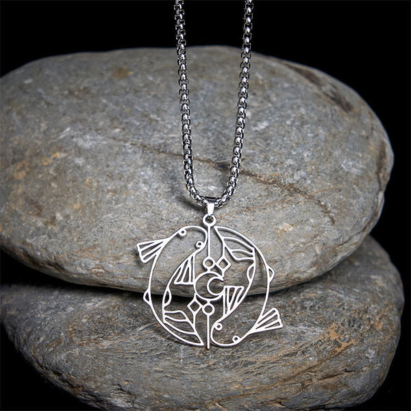 Vintage Koi Fish Hollow Luck Necklace – silver koi pendant on stacked river stones, black background