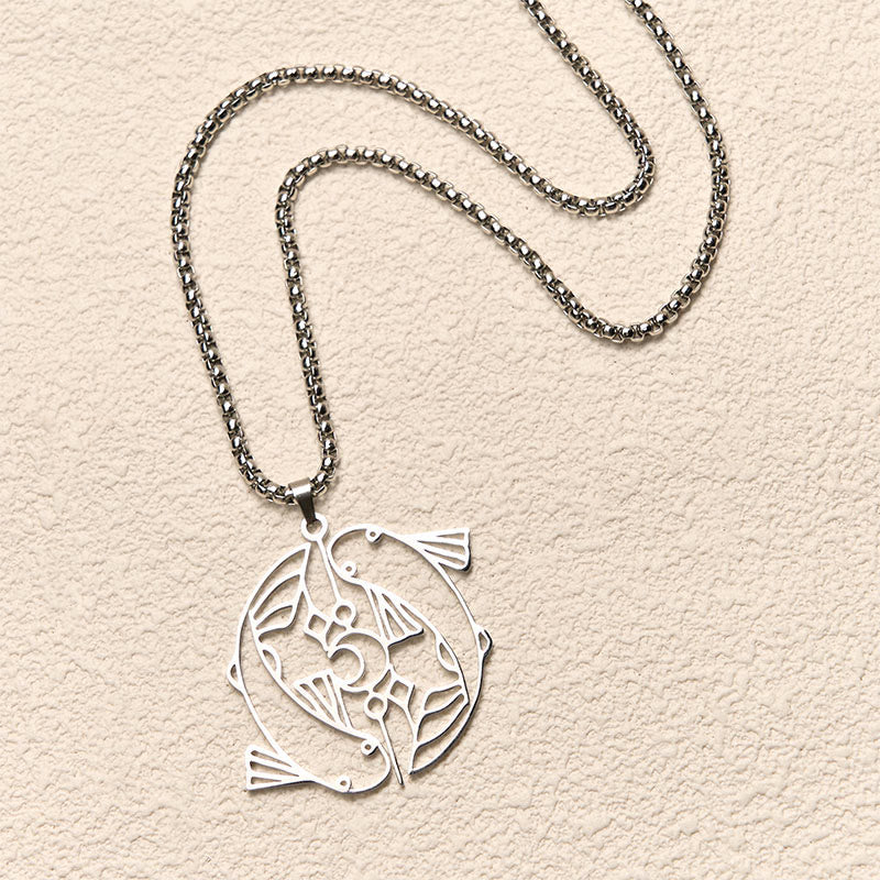 Vintage Koi Fish Hollow Luck Necklace – silver koi pendant, flat-lay S-curve on cream paper background