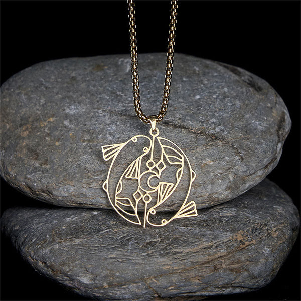 Vintage Koi Fish Hollow Luck Necklace – gold koi pendant on river stones, dark chain contrast, black bg