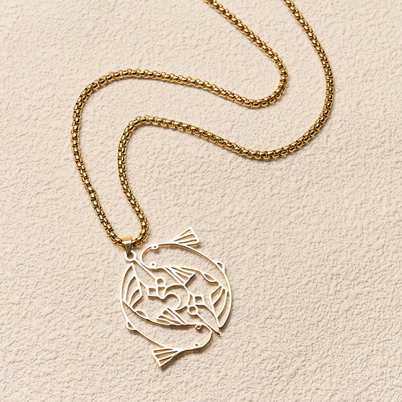Vintage Koi Fish Hollow Luck Necklace – gold koi pendant, diagonal flat-lay on cream textured background