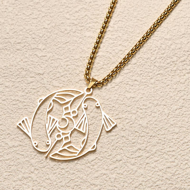 Vintage Koi Fish Hollow Luck Necklace – gold koi pendant, overhead angle on cream textured background