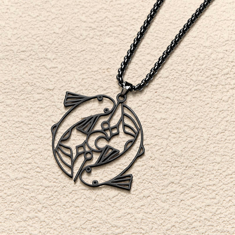 Vintage Koi Fish Hollow Luck Necklace – black koi pendant, top-down on cream textured background