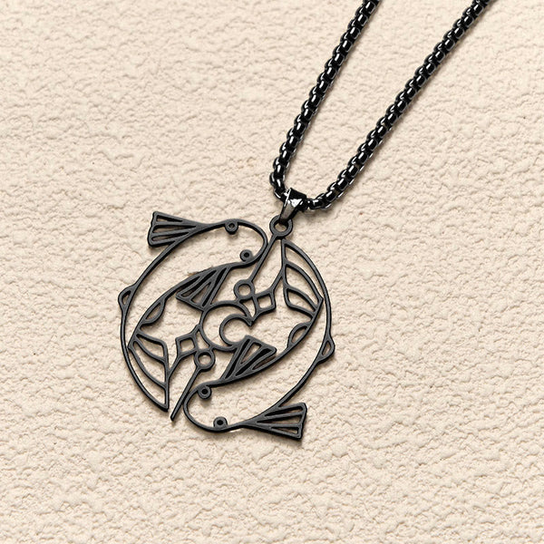 Vintage Koi Fish Hollow Luck Necklace – black koi pendant, top-down on cream textured background