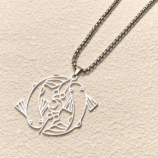 Vintage Koi Fish Hollow Luck Necklace – silver koi pendant, three-quarter view on cream textured background